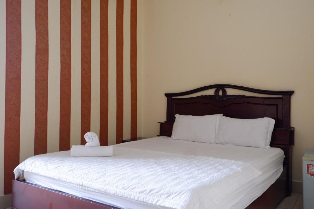 Reddoorz Tuan Viet Hotel Dinh Tien Hoang โฮจิมินห์ซิตี้ ภายนอก รูปภาพ